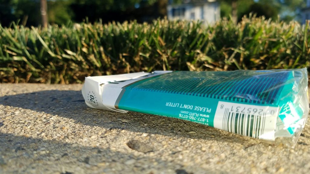 Use menthol pack of cigarettes on the ground